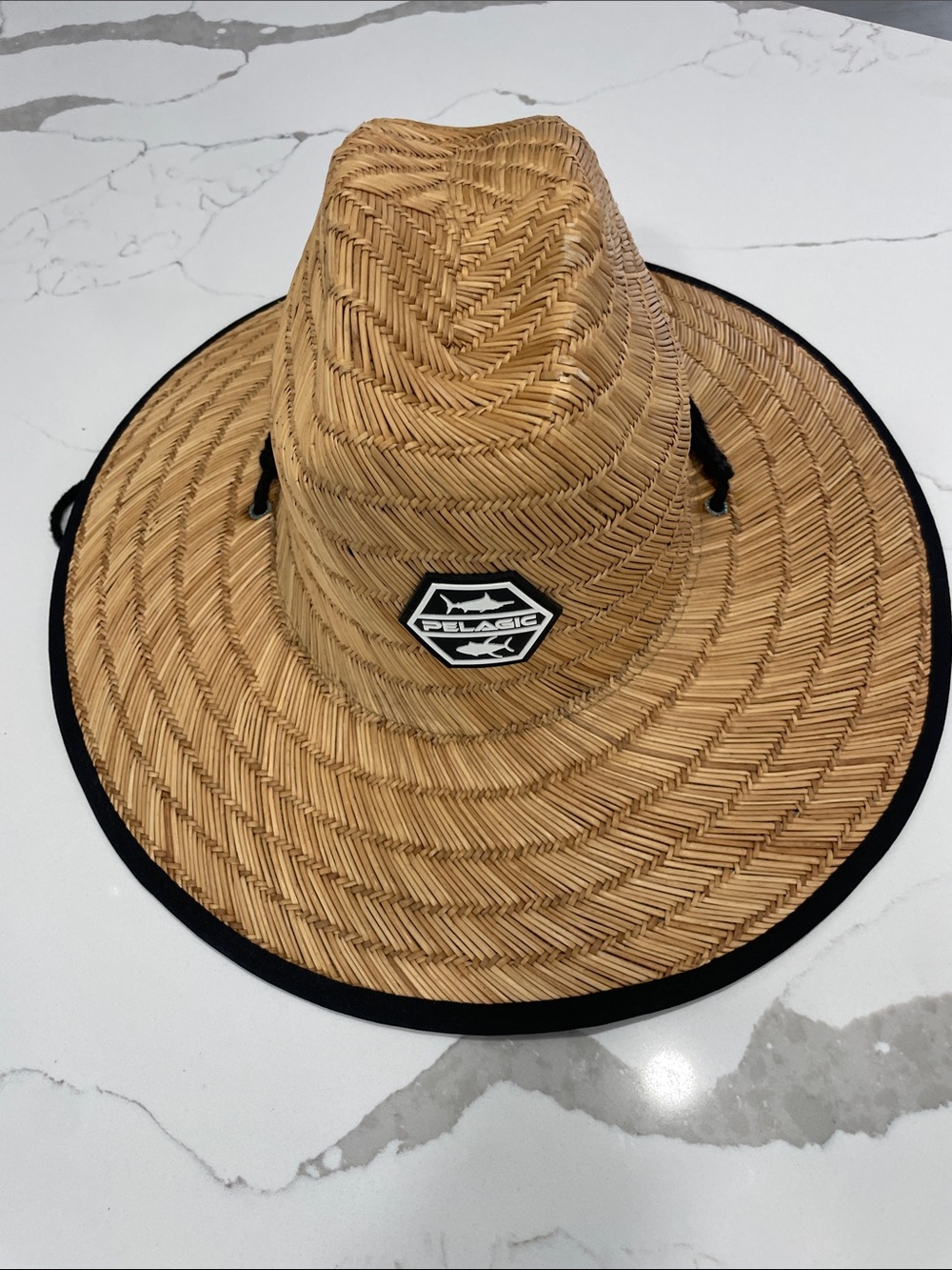 Pelagic Straw Sun Hat in Tan with Black Trim